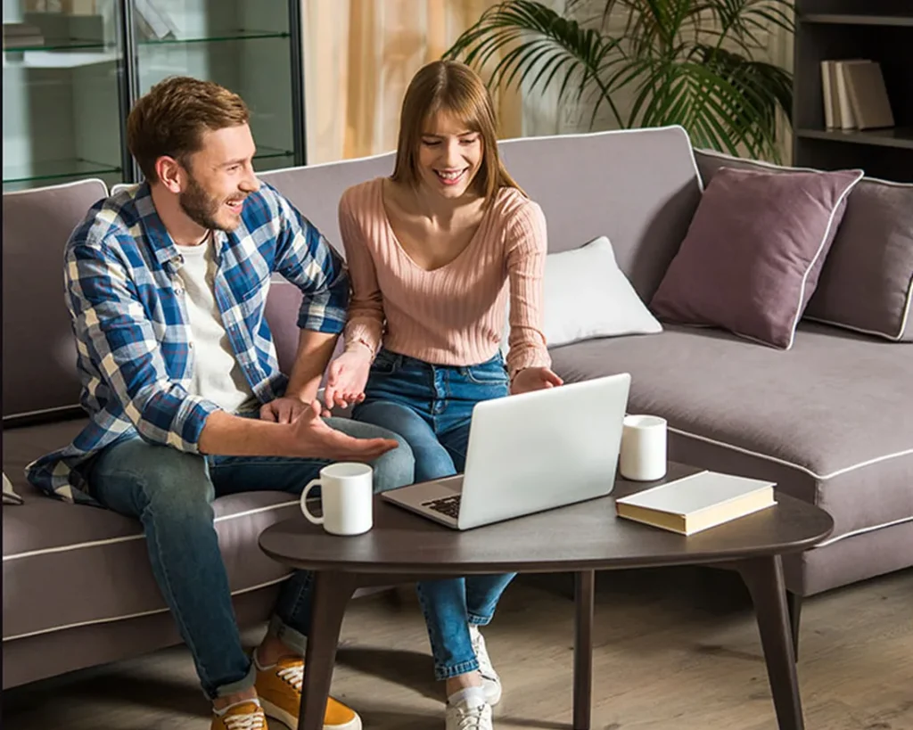 Homebuyers reviewing information together